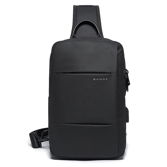 Black BANGE chest sling bag with top handle and front zip pocket.