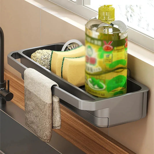 Gray self-draining sink shelf organizer with side towel holders and slim base