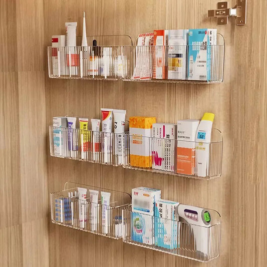 Clear wall-mounted medicine and cosmetic organizer with three long horizontal trays
