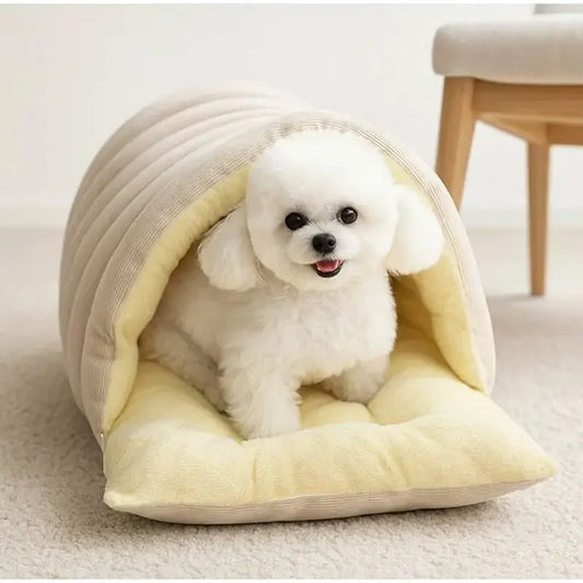 Plush cat cave bed in cream with ribbed fabric dome and padded front opening