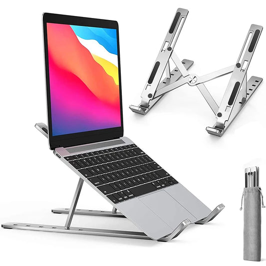 Silver laptop stand in use, adjustable foldable bracket holding a notebook computer.