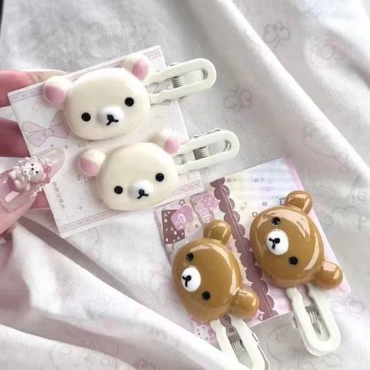 Cute bear hairpins set with white and brown plush faces, on white plastic clips