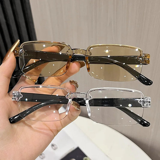 Reading glasses set with clear lenses and gold and black frames
