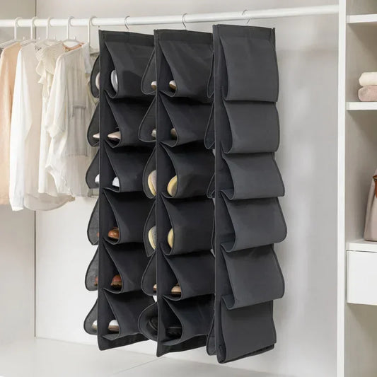 Dark gray shoe storage hanging organizer with multiple stacked compartments