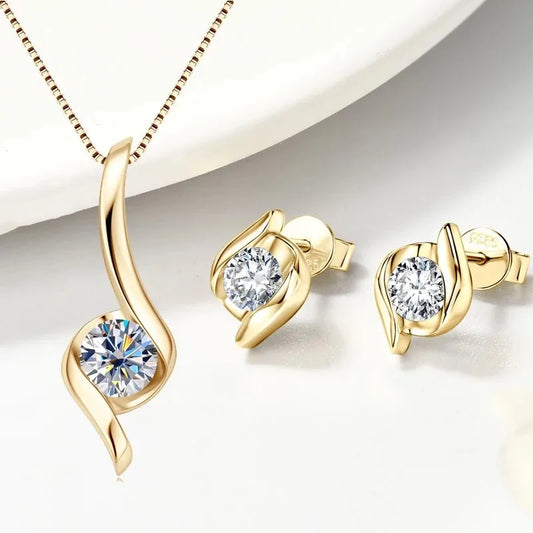 Gold-tone moissanite jewelry set with pendant necklace and matching stud earrings