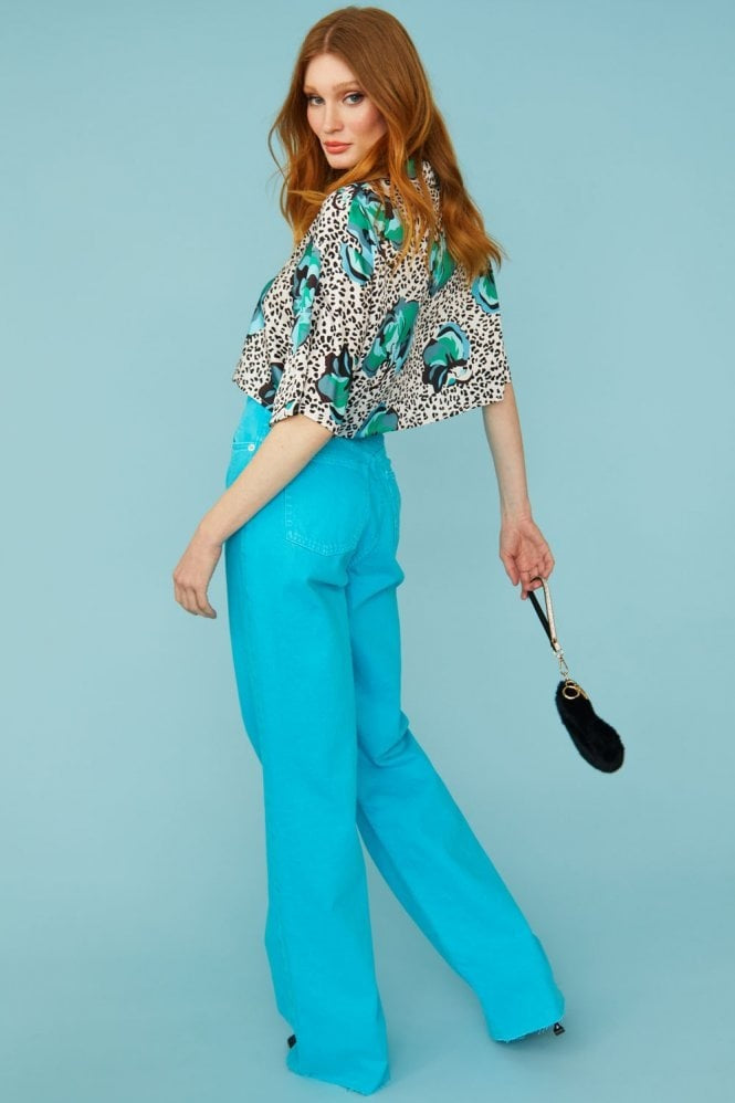 Silk-blend cropped blouse in leopard print with teal floral motifs, short sleeves