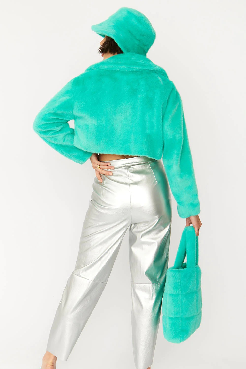 Turquoise faux fur bucket hat with floppy brim, side and back view
