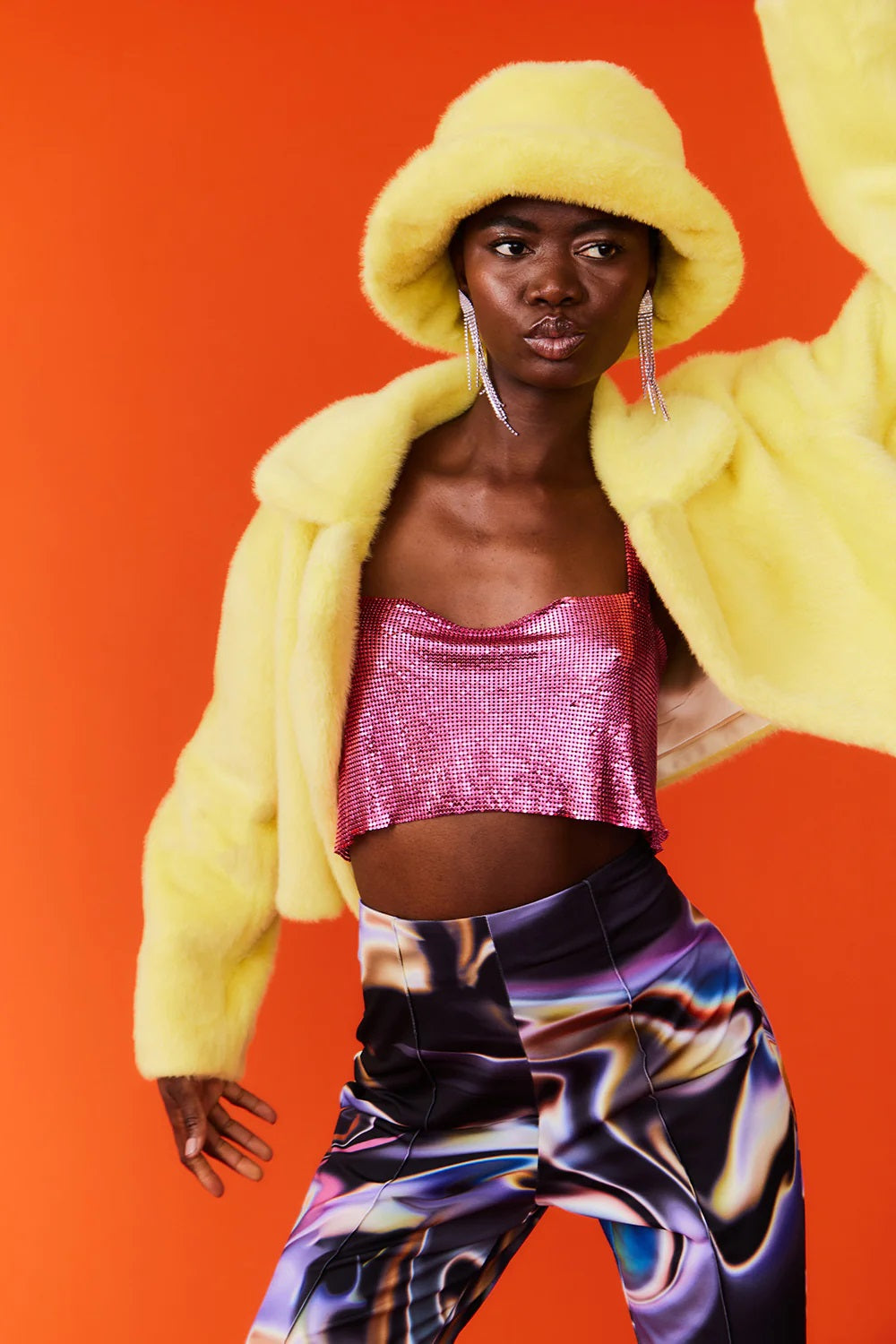 Yellow faux fur bucket hat with soft plush texture and wide brim