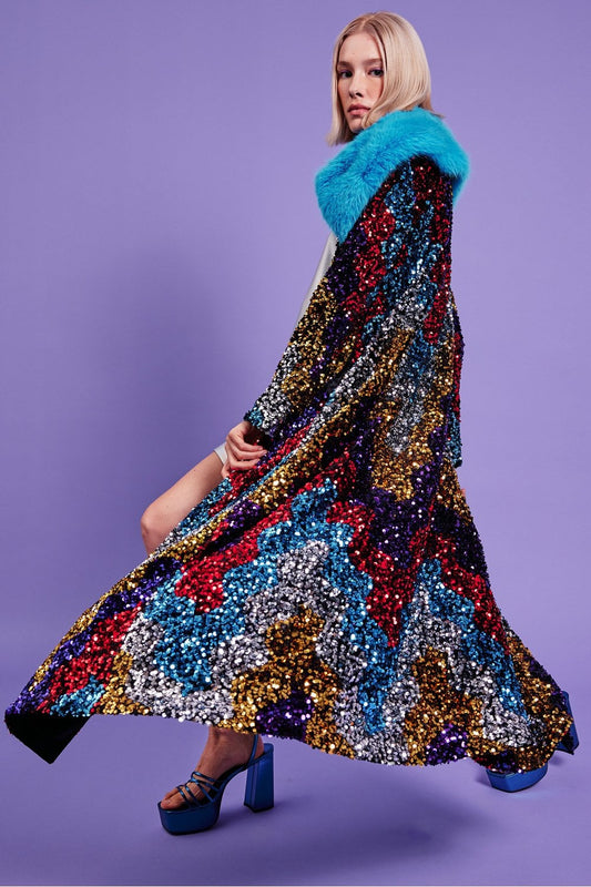 Multicolor sequin velvet trench coat with blue faux fur collar, flared long sleeves