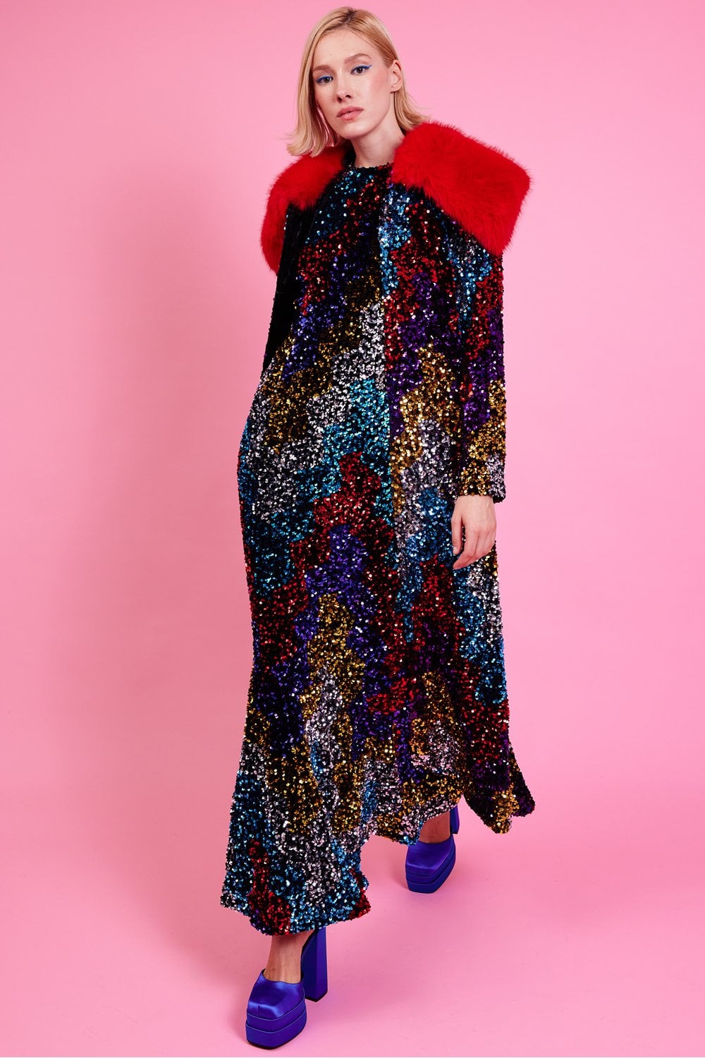 Long sequin velvet trench coat, dark black with red faux fur collar, front view
