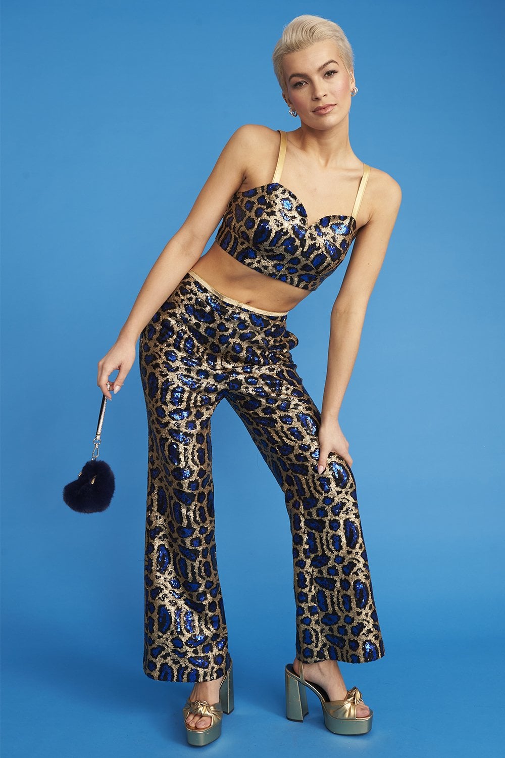 Navy and gold leopard sequin halter crop top with thin straps and keyhole