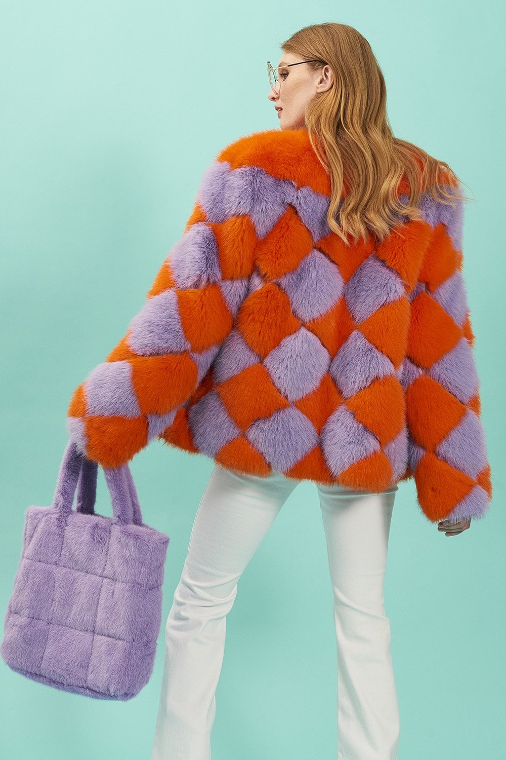 Women’s faux fur jacket, orange and purple diamond pattern, back view, long sleeves