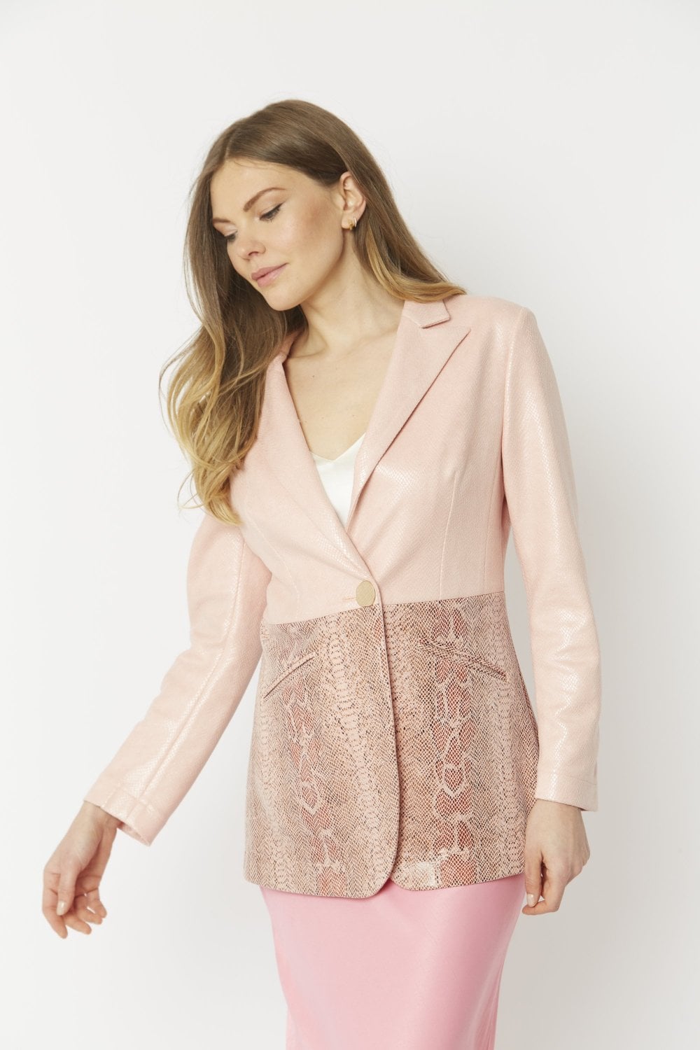 Pink suede-look blazer-style jacket with snake-pattern front panel and button closure.