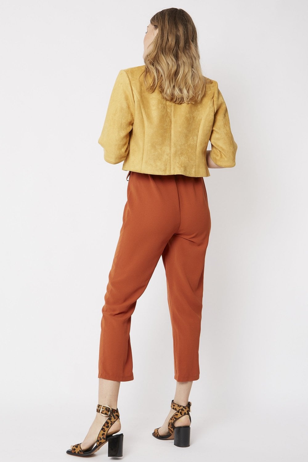 Yellow faux suede cropped jacket with short sleeves, back view